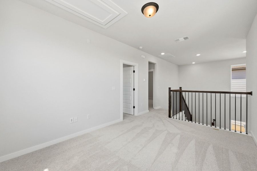 Spacious, unfurnished interior of a new home in Terrace Collection At Turner's Crossing, Buda (Image 43).