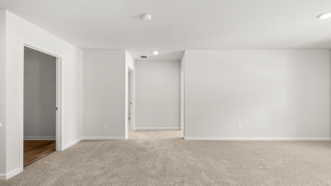 Representative unfurnished interior of a home built from the Hanover by D.R. Horton in Northwoods at Mirror Lake, Villa Rica (Image 32).