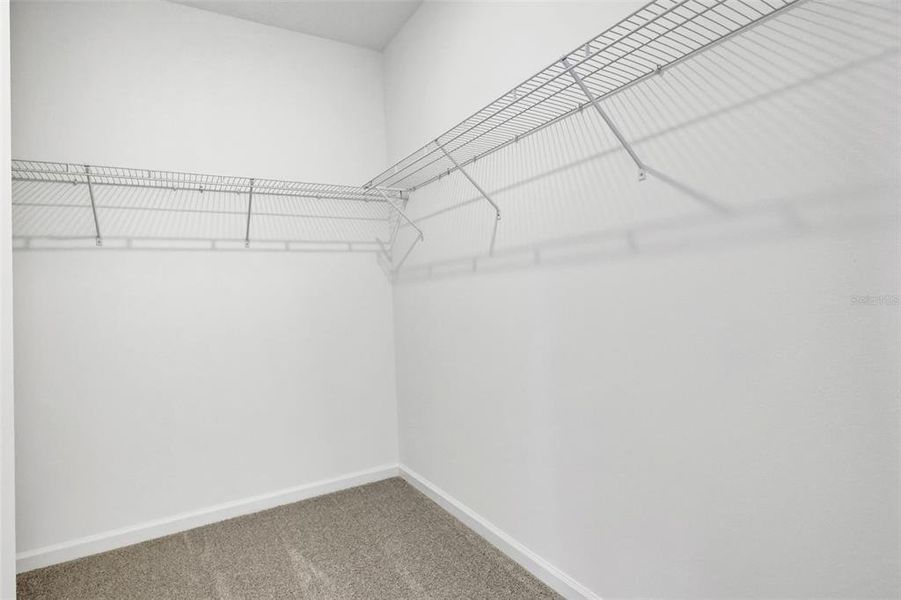 Spacious, unfurnished interior of a new home in Serenade at Ovation, Winter Garden (Image 17).