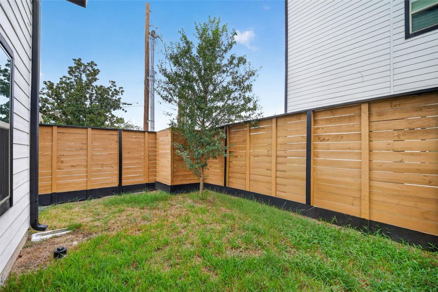 Exterior details and patio area of a home in , Houston (Image 4).
