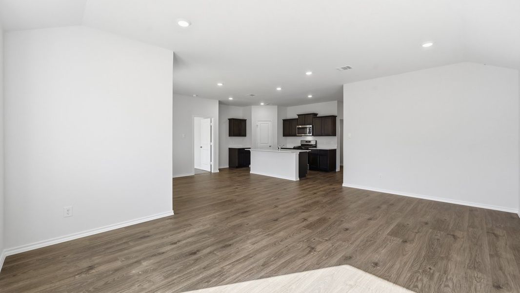 Representative unfurnished interior of a home built from the Damara by D.R. Horton in Windrose, Pilot Point (Image 6).