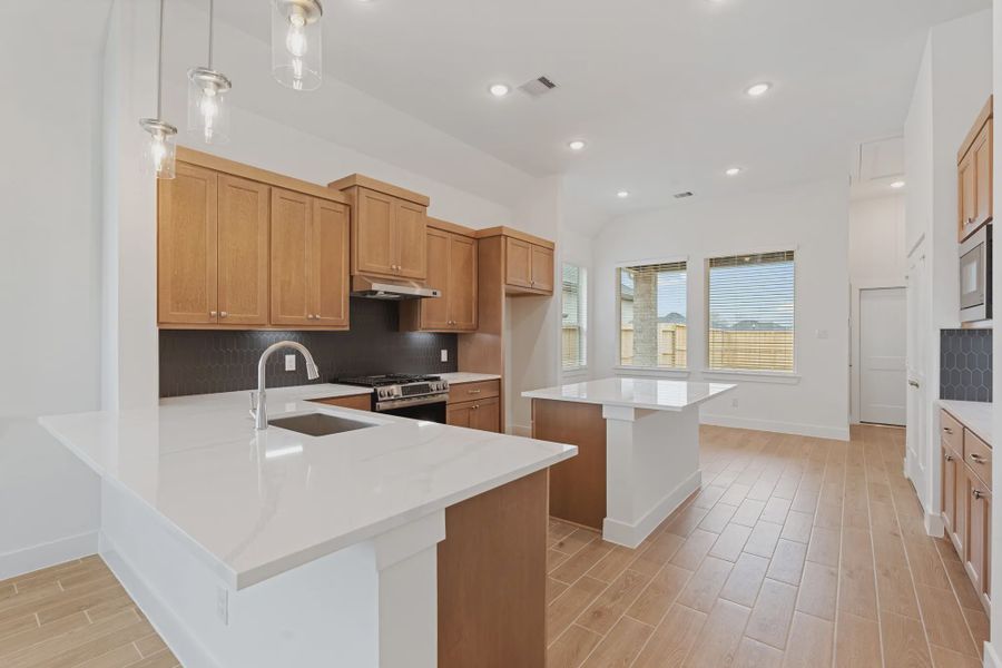 Representative furnished interior of a home built from the Torrey Pines by Chesmar Homes in Riceland Alley Loads, Mont Belvieu (Image 6).