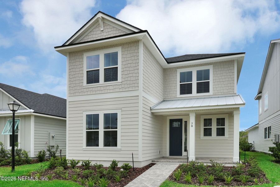 Front exterior of a new home in Seabrook Village at Seabrook, Nocatee, FL, highlighting curb appeal (Image 26).