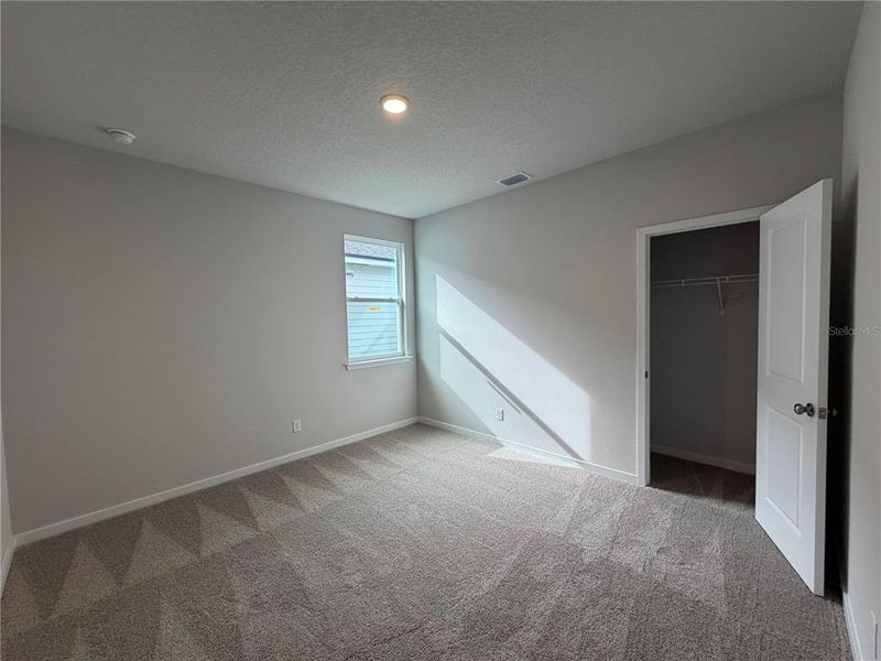 Spacious, unfurnished interior of a new home in The Magnolia Series at Reserve East, Flagler Beach (Image 29). Spacious, unfurnished interior of a new home in The Magnolia Series at Reserve East, Flagler Beach (Image 29).