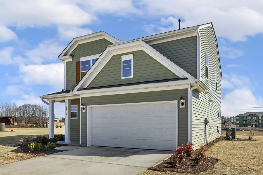 Front exterior of a new home in 1158 Place, Wilson, NC, highlighting curb appeal (Image 22).