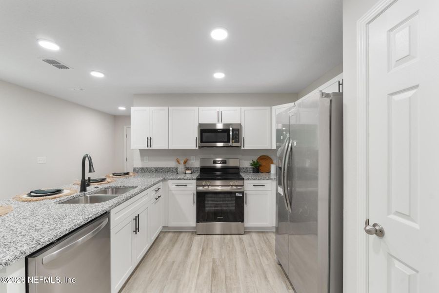 Furnished interior view inside a new home in , Jacksonville (Image 10). Furnished interior view inside a new home in , Jacksonville (Image 10).