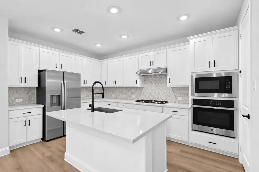 Furnished interior view inside a new home in Cross Creek Meadows, Celina (Image 8).