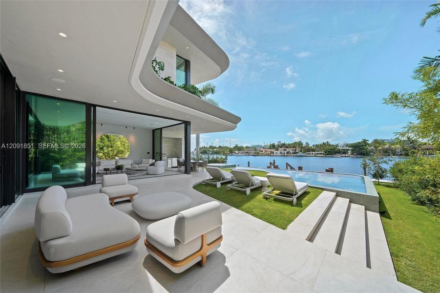 Exterior details and patio area of a home in , Miami Beach (Image 22). Exterior details and patio area of a home in , Miami Beach (Image 22).