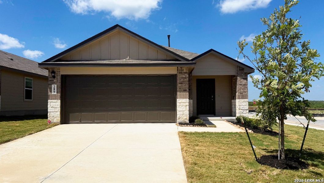 Front exterior of a new home in Redbird Ranch, San Antonio, TX, highlighting curb appeal (Image 2).