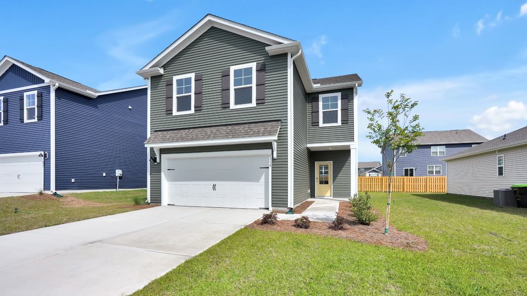 Front exterior of a new home in Bella Point, Bolivia, NC, highlighting curb appeal (Image 1). Front exterior of a new home in Bella Point, Bolivia, NC, highlighting curb appeal (Image 1).