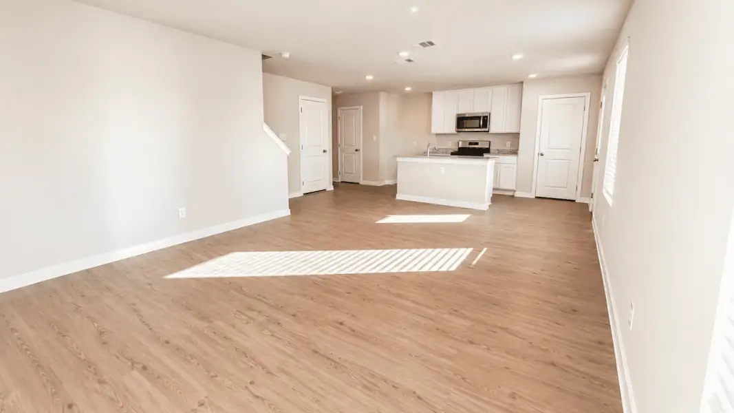 Representative unfurnished interior of a home built from the Davis by D.R. Horton in Flagstop Crossing, Odem (Image 13).