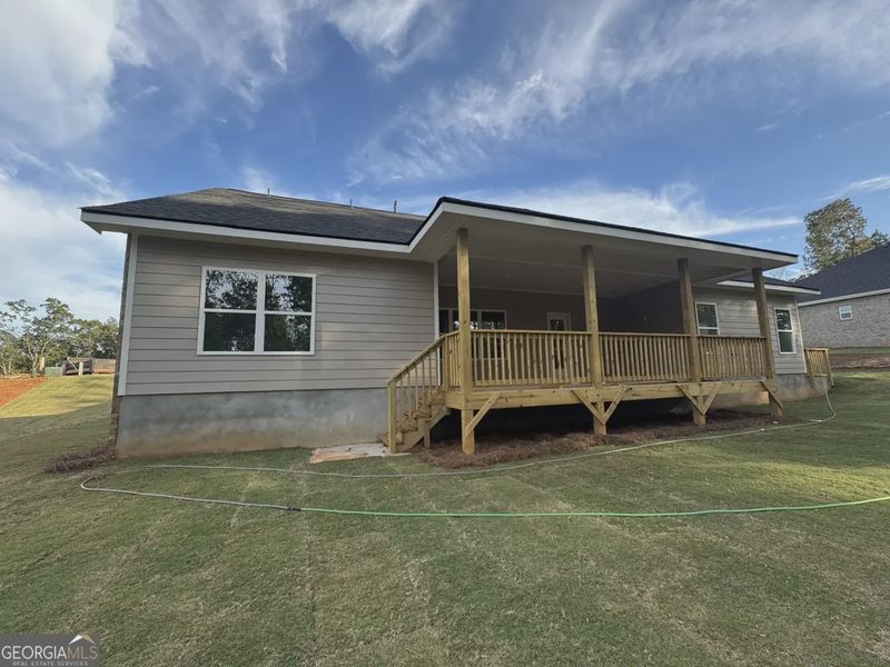 Exterior details and patio area of a home in Tuscany Hills, Douglasville (Image 20). Exterior details and patio area of a home in Tuscany Hills, Douglasville (Image 20).