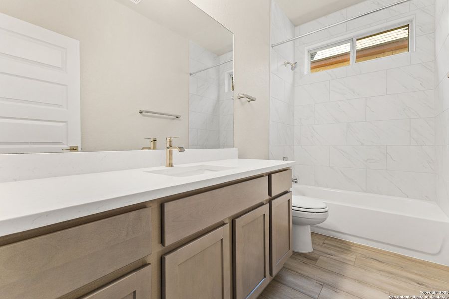 Furnished interior view inside a new home in The Enclave at Potranco Oaks, Castroville (Image 11).