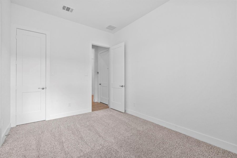 Spacious, unfurnished interior of a new home in Grange, Katy (Image 26).