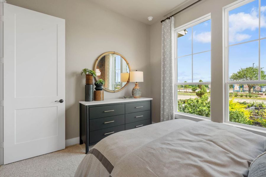 Furnished interior view inside a new home in Meridiana, Manvel (Image 6).