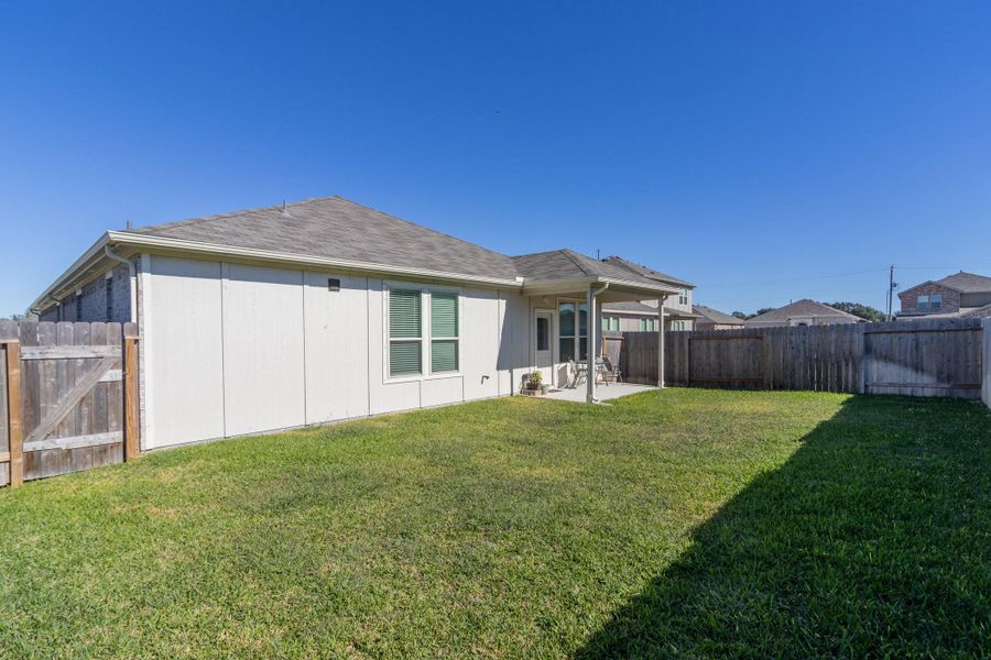 Exterior details and patio area of a home in Mustang Ridge, Alvin (Image 29). Exterior details and patio area of a home in Mustang Ridge, Alvin (Image 29).
