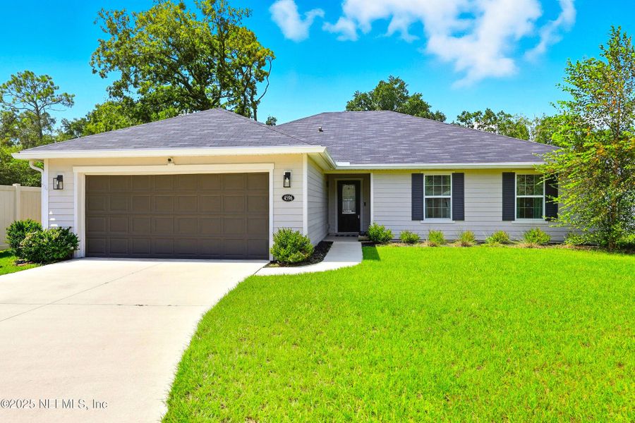 Front exterior of a new home in , Jacksonville, FL, highlighting curb appeal (Image 20).
