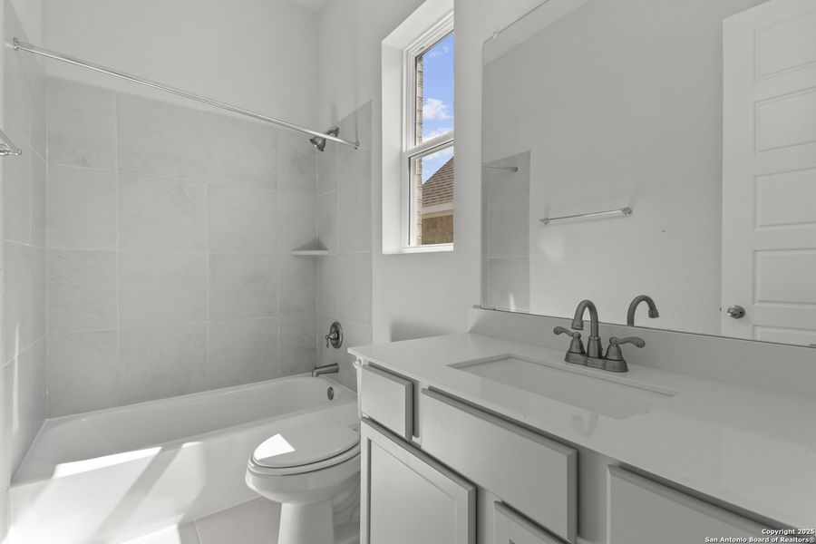 Furnished interior view inside a new home in Stillwater Ranch 60', San Antonio (Image 5).