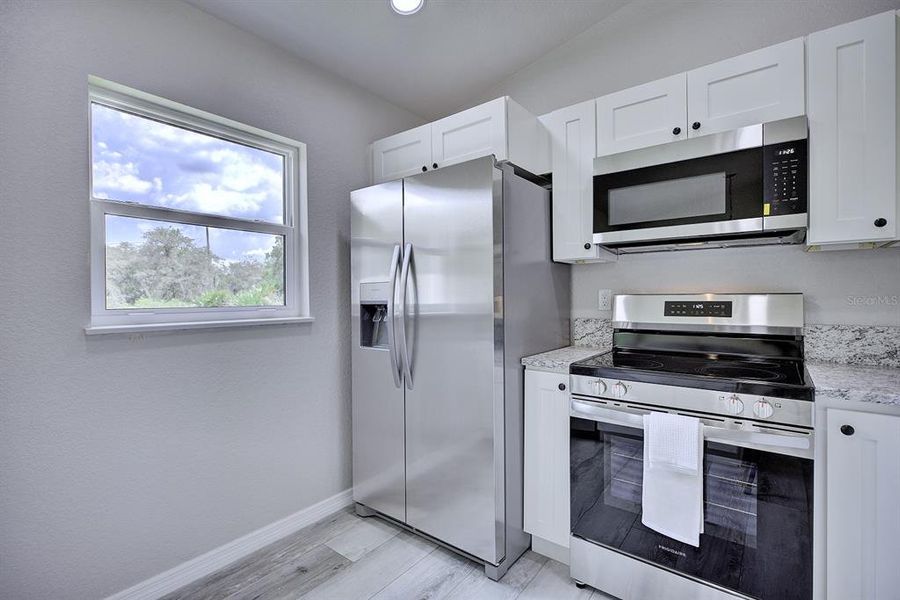 Furnished interior view inside a new home in , Avon Park (Image 6).