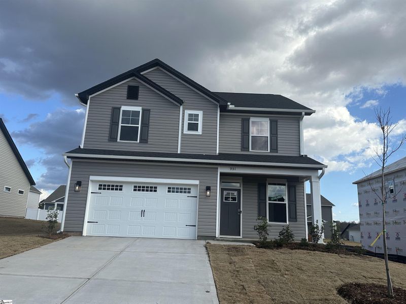 Front exterior of a new home in Shiloh Trail, Wellford, SC, highlighting curb appeal (Image 2).