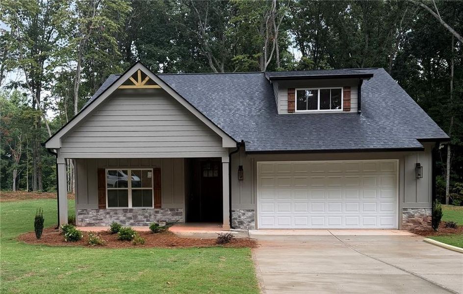 Front exterior of a new home in , Bremen, GA, highlighting curb appeal (Image 1). Front exterior of a new home in , Bremen, GA, highlighting curb appeal (Image 1).