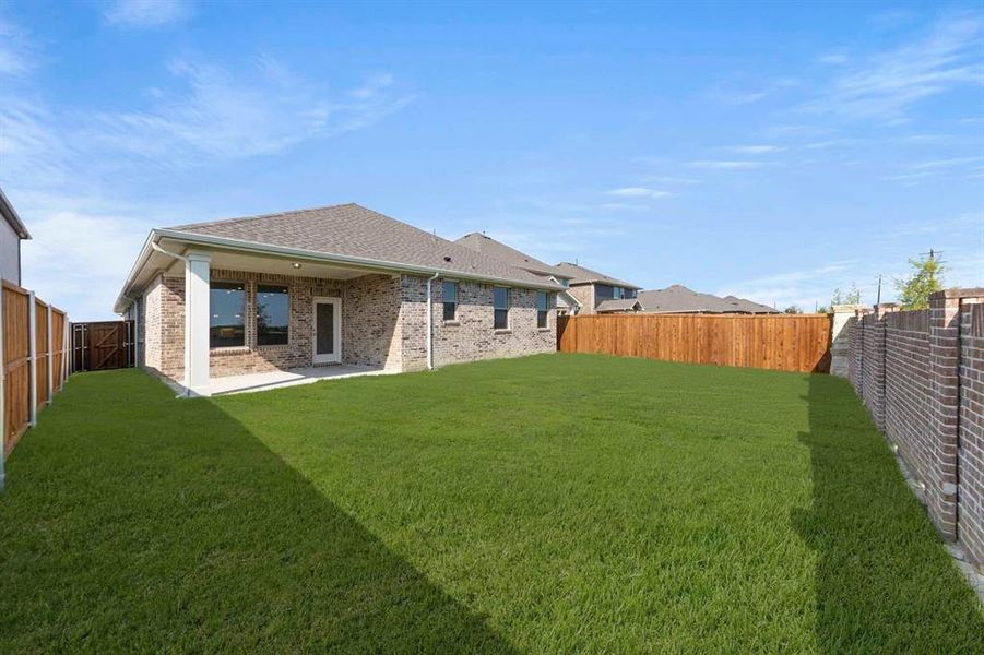 Exterior details and patio area of a home in Brookshire at Legacy Hills-50s, Celina (Image 22).