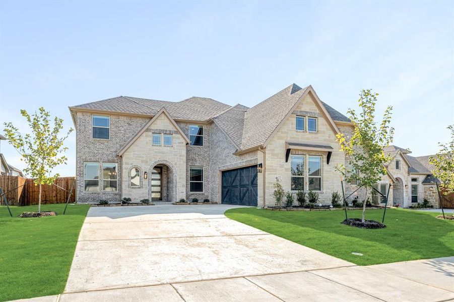 Front exterior of a new home in Ridgepoint, Midlothian, TX, highlighting curb appeal (Image 25).