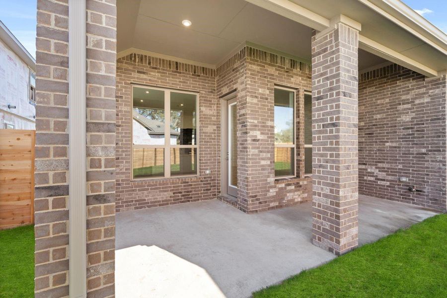 Rear of Home and Private Backyard