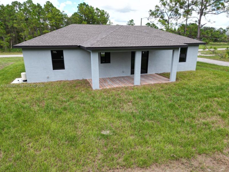 Exterior details and patio area of a home in , Lehigh Acres (Image 3). Exterior details and patio area of a home in , Lehigh Acres (Image 3).