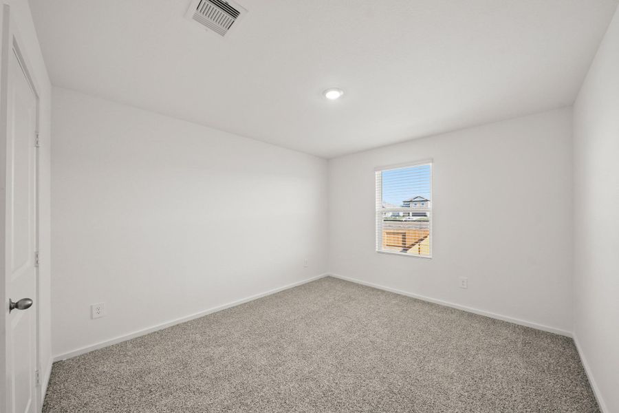 Spacious, unfurnished interior of a new home in The Canopies, Splendora (Image 8).