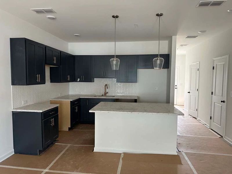 Kitchen featuring Luxe Collection Finishes Construction Progress