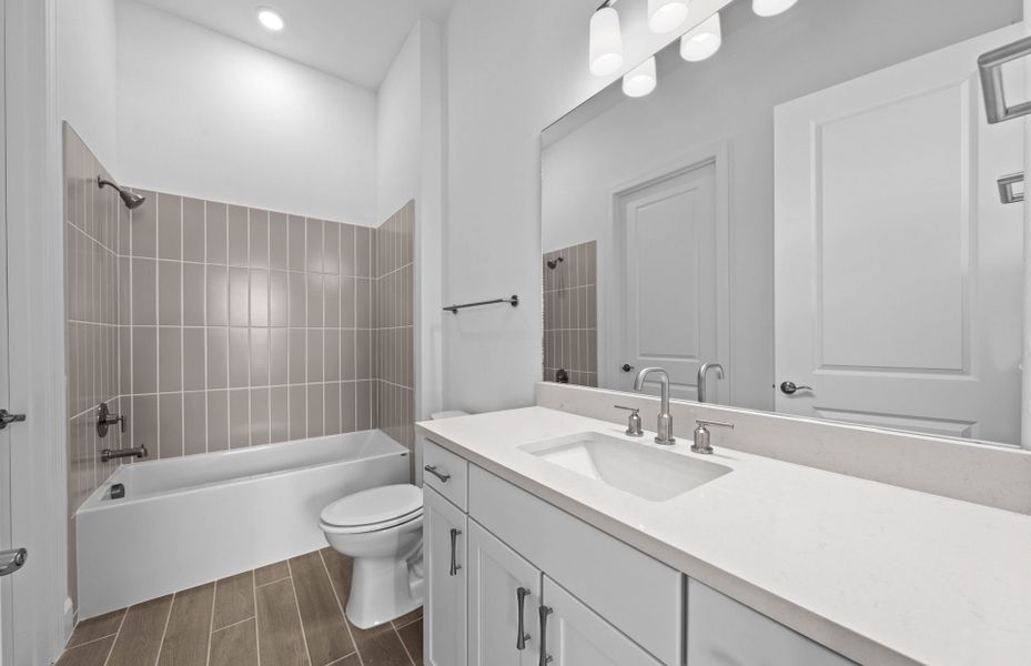 Furnished interior view inside a new home in BeachWalk by Manasota Key, Englewood (Image 16).