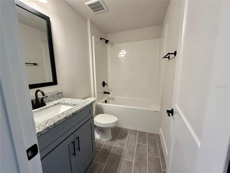 Furnished interior view inside a new home in , Port Charlotte (Image 4). Furnished interior view inside a new home in , Port Charlotte (Image 4).