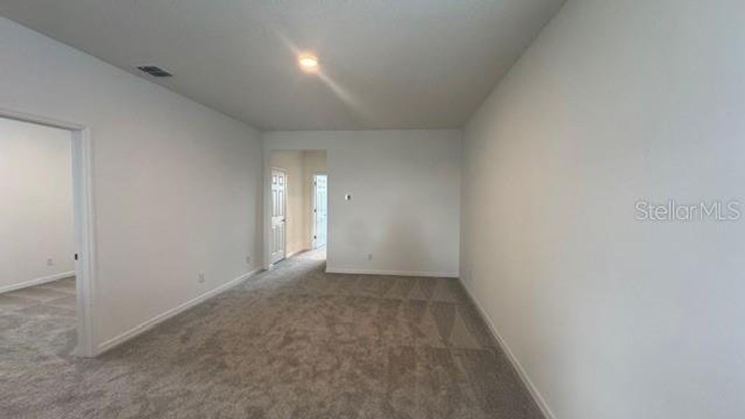 Spacious, unfurnished interior of a new home in Cypress Bluff, Groveland (Image 12).