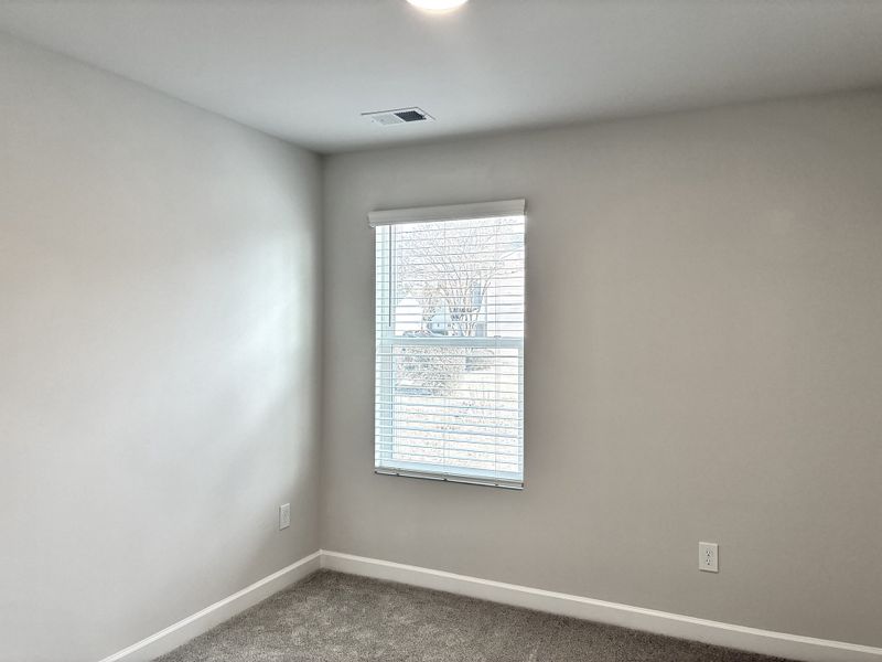 Spacious, unfurnished interior of a new home in Holly View, Greenville (Image 18).