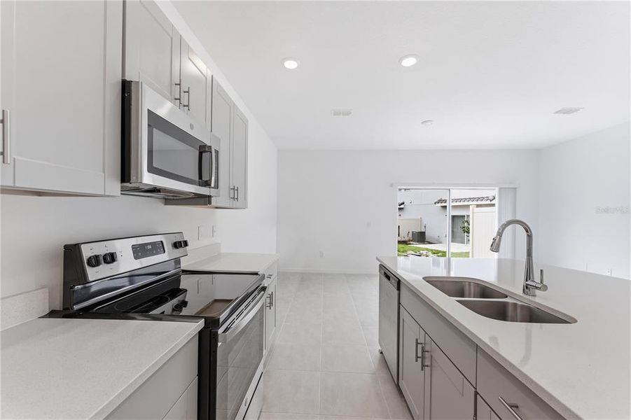 Furnished interior view inside a new home in , Kissimmee (Image 6).