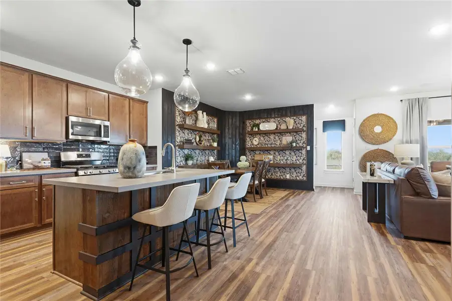 Model home photos of similar floorplans, not pictures of actual home.