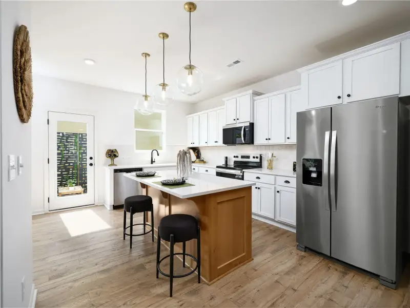 Furnished interior view inside a new home in Dukes Ridge, Charlotte (Image 3).
