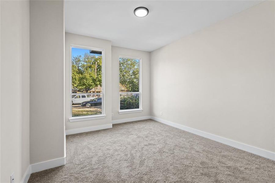 View of carpeted spare room