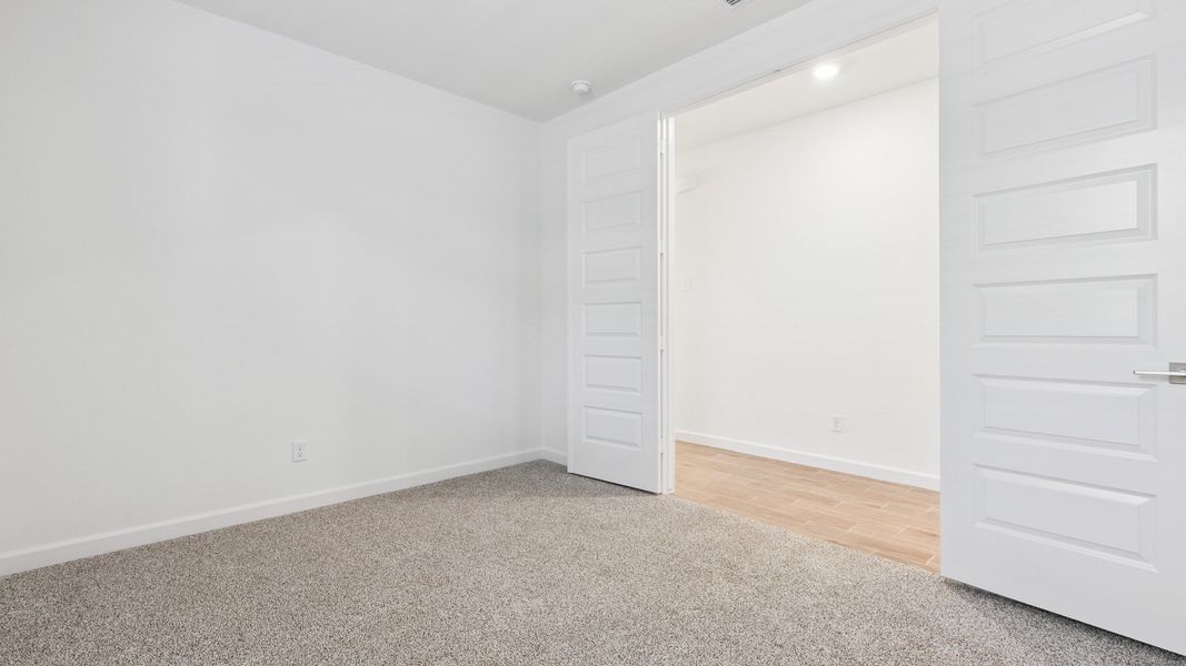 Spacious, unfurnished interior of a new home in Zanjero Pass, Waddell (Image 28).