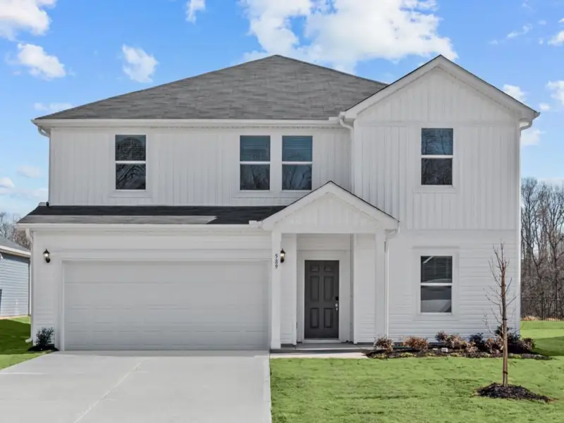 Front exterior of a new home in Creek Ridge - Signature Collection, Spartanburg, SC, highlighting curb appeal (Image 1). Front exterior of a new home in Creek Ridge - Signature Collection, Spartanburg, SC, highlighting curb appeal (Image 1).