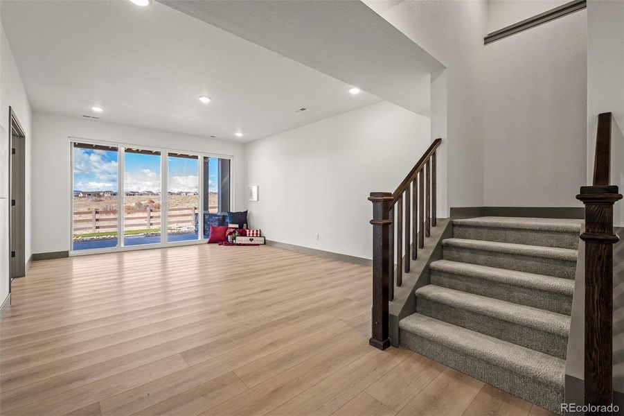 Spacious, unfurnished interior of a new home in Revel Crossing at Wolf Ranch - The Panorama Collection, Colorado Springs (Image 37).