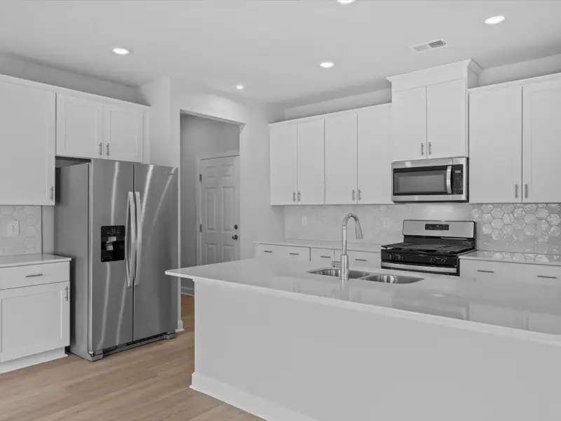 Furnished interior view inside a new home in Chatham Forest, Duncan (Image 4).