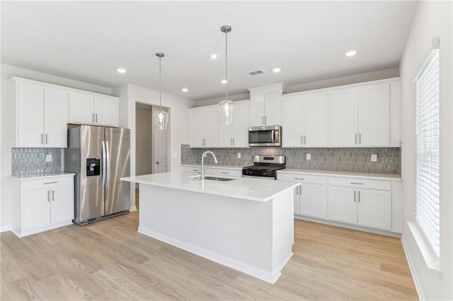 Furnished interior view inside a new home in Parkside at Grayson, Grayson (Image 8).