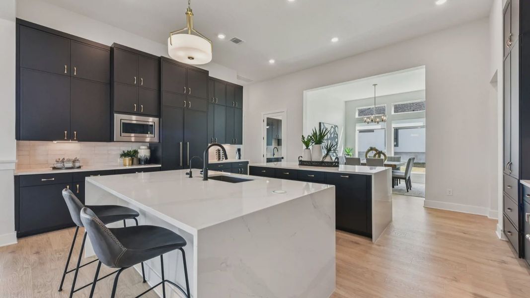 Representative furnished interior of a home built from the Garet by Chesmar Homes in Feathergrass, Florence (Image 8).