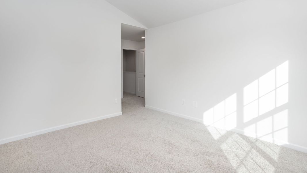 Spacious, unfurnished interior of a new home in The Gables at Edinborough Townes, Gibsonville (Image 15).