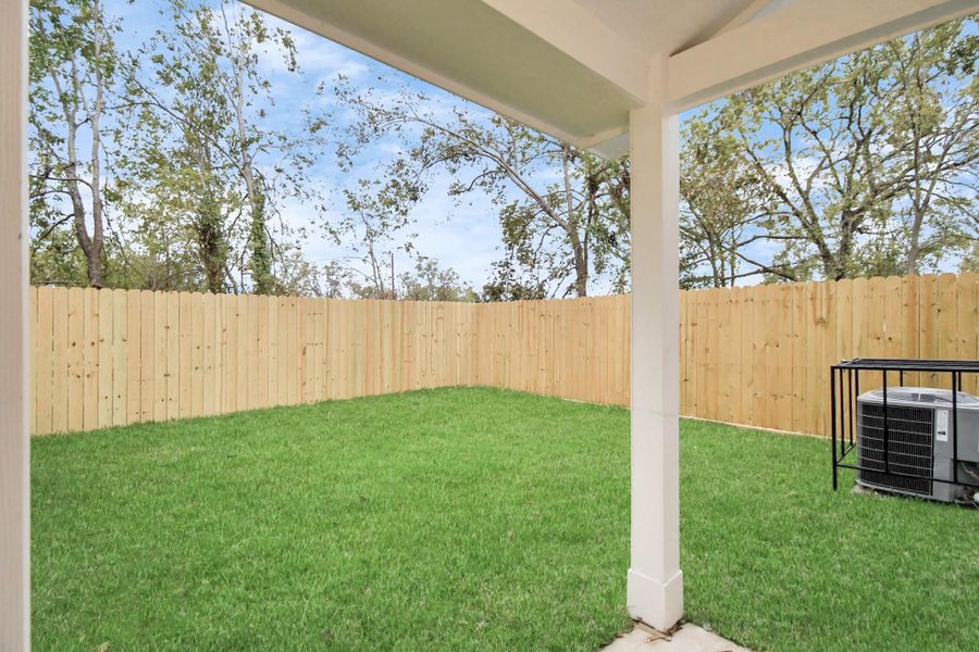 Exterior details and patio area of a home in , Houston (Image 21). Exterior details and patio area of a home in , Houston (Image 21).