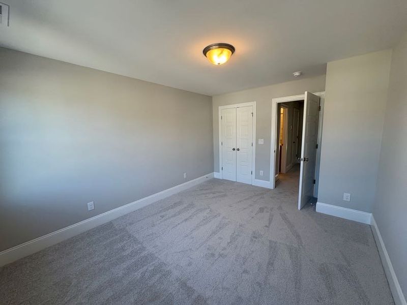 Spacious, unfurnished interior of a new home in Riverside Cove, Wilmington (Image 38).