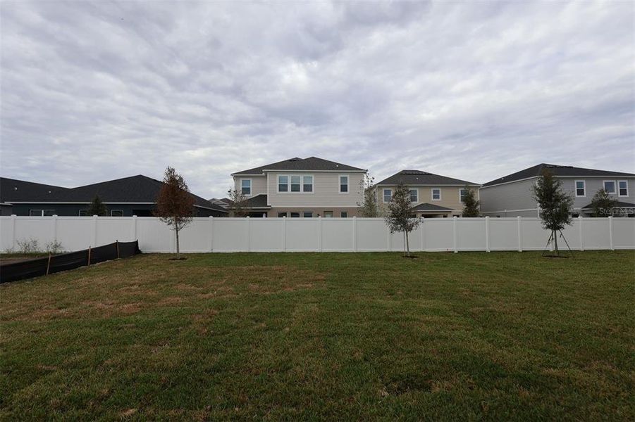 Exterior details and patio area of a home in Estates at Rivercrest, Sanford (Image 14). Exterior details and patio area of a home in Estates at Rivercrest, Sanford (Image 14).
