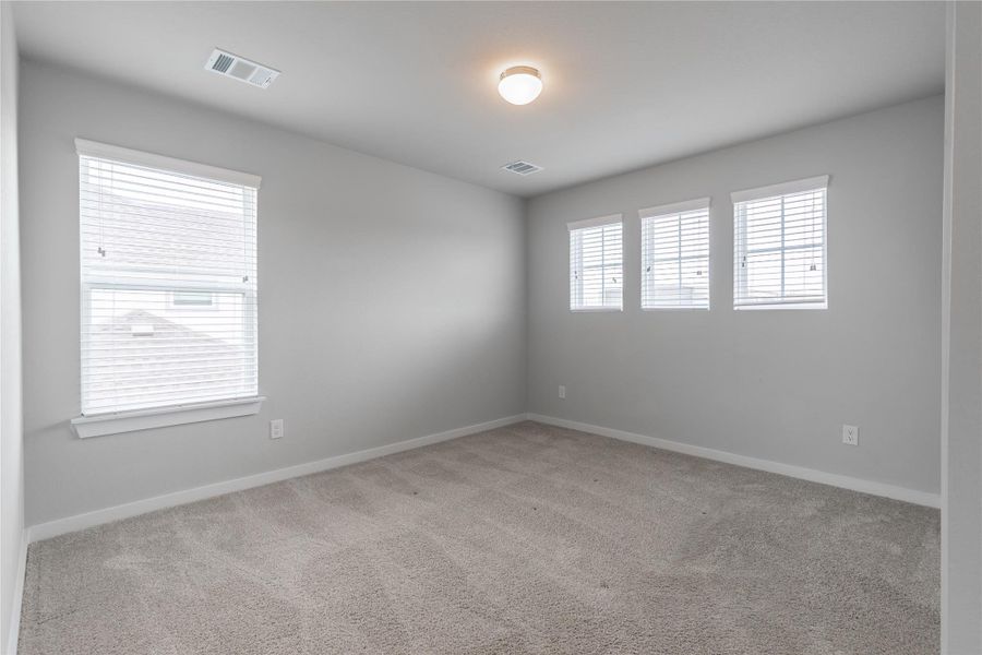 Spacious, unfurnished interior of a new home in Morton Creek Ranch, Katy (Image 33).